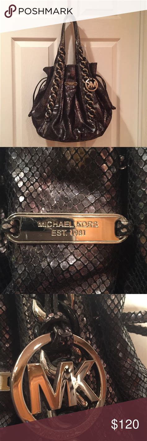 does michael kors use fake snake skin klutch|michael kors bag identification.